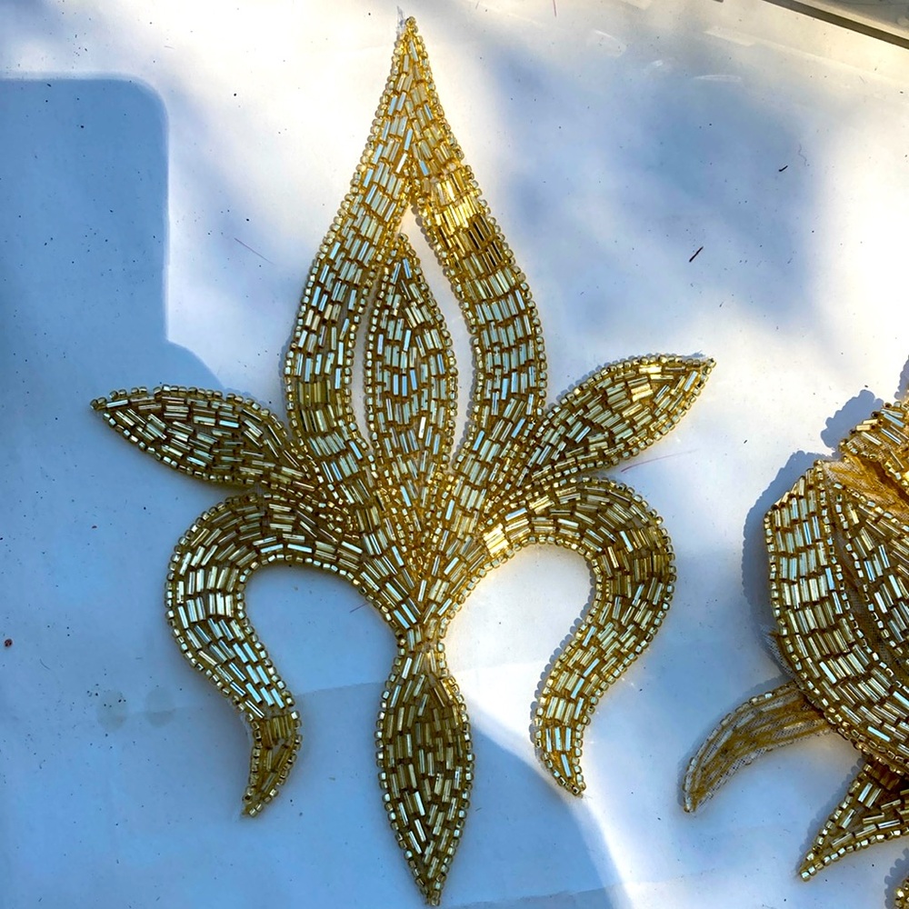 7 Gold beaded Fleur de lis appliqués